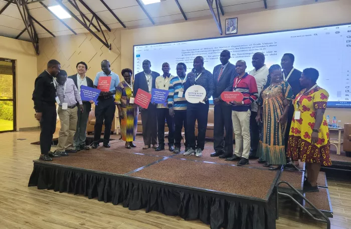 Delegates from Uganda, Malawi and Kenya pose for a picture together