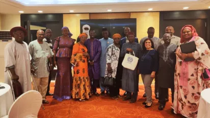 Meeting participants pose for a group picture